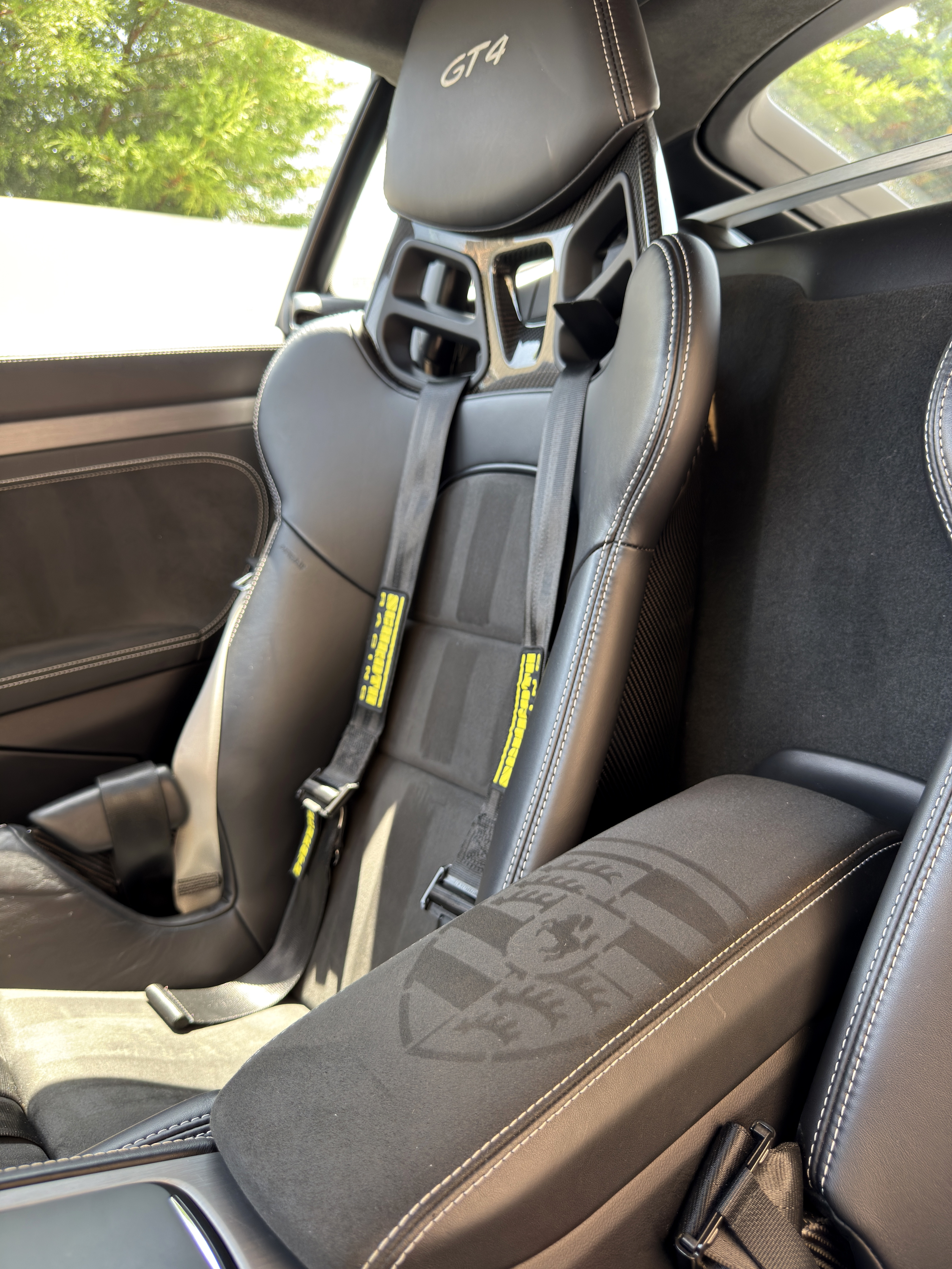 Premium car interior with stencil finish on Alcantara seat